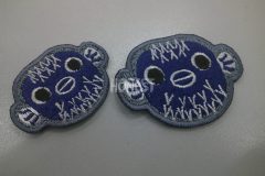 青色のフグのキャラクターを刺繡した、オリジナル刺繡ワッペンの制作実績。