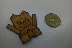 オリジナル刺繡ワッペンの制作事例。五円玉大の大きさにも対応しています。