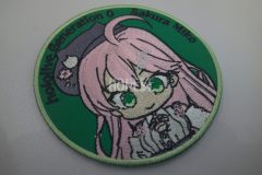 ピンクの髪の毛が可愛い女の子のキャラクターを刺繡した、オリジナル刺繡ワッペンの制作実績。