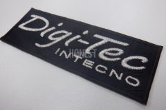 黒い生地に銀糸で車屋の企業ロゴを刺繡した、オリジナル刺繡ワッペンの制作実績。