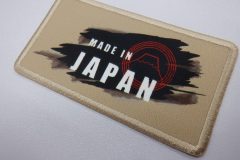 隅で黒く塗りつぶしたようなベタ部分がインパクトのあるプリントワッペンの試作事例。