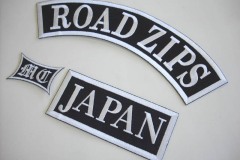 黒地に白糸の組み合わせが、シンプルで力強い印象の３つのオリジナル刺繡ワッペンの制作事例。