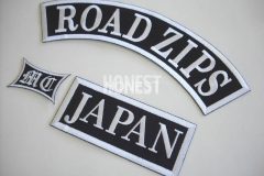 黒地に白糸の組み合わせが、シンプルで力強い印象の３つのオリジナル刺繡ワッペンの制作事例。