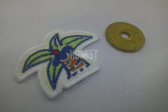 椰子の木をモチーフにしたオリジナル刺繡ワッペンの制作事例。ししゅう屋HONESTは５円玉ほどの小さなワッペンも精密に加工できます。