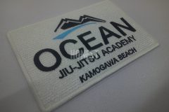 山と海をモチーフにした柔術チームのオリジナル刺繡ワッペンの制作実績。