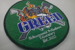 消防チームのテーマであるGREEDを目立たせ、キャラクターと消防道具を刺繡したオリジナル刺繡ワッペンの制作実績。