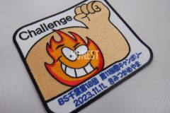 上腕二頭筋の中が燃えてるイラストが特徴的なボーイスカウトのオリジナル刺繡ワッペンの制作実績。
