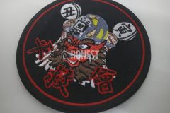 丑寅の纏を掲げた勇ましい顔の鬼の迫力のある刺繡が特徴のオリジナル刺繡ワッペンの制作実績。