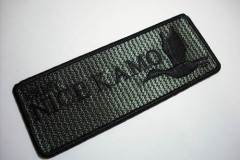 濃オリーブ色のクロス生地に、黒糸で刺繡したオリジナル刺繡ワッペンの制作実績。