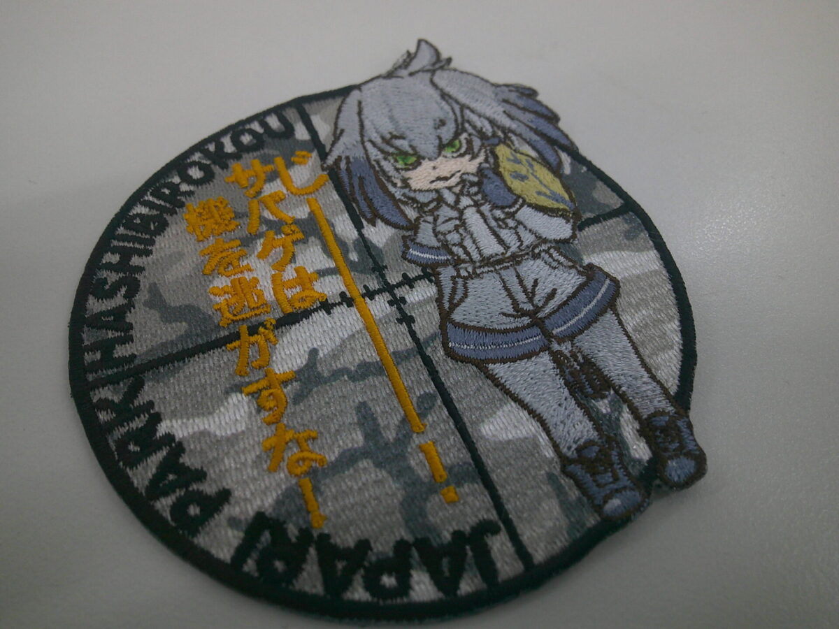 ミックスワッペンの制作実績。カモフラデザインとキャラクター刺繍の混合制作。