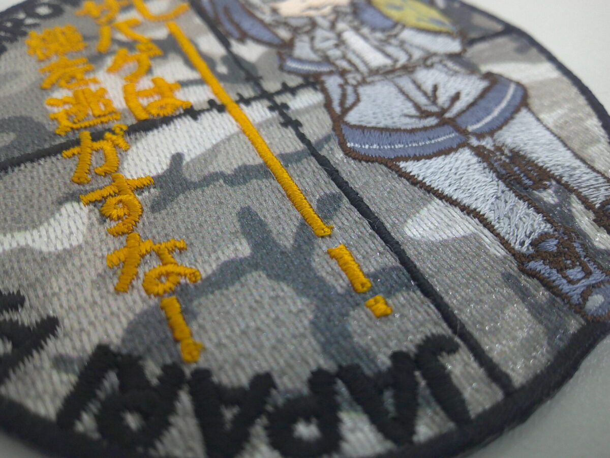 ミックスワッペンの制作実績。カモフラデザイン部分のアップと刺繍との質感差を示すもの。